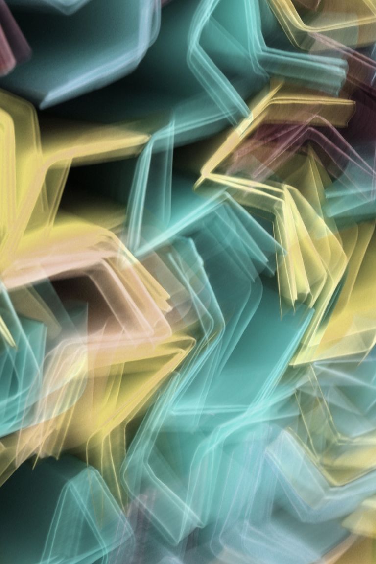 Dynamic abstract light painting with vibrant colors and geometric shapes, perfect for creative designs.